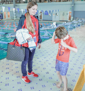 DSC02383 Prent on pool deck with child refusing to get in the pool